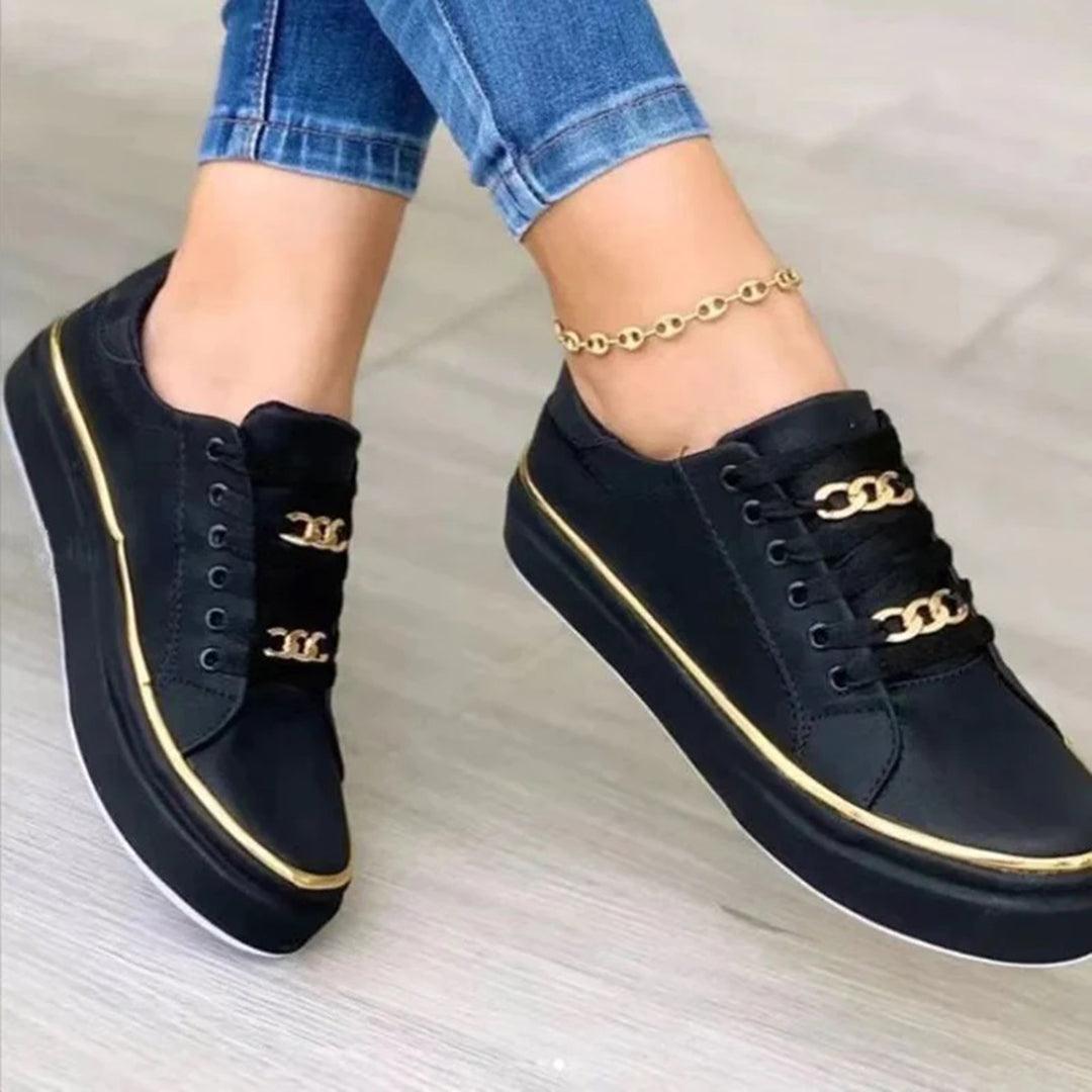 Elegante Damen-Sneaker mit goldenen Akzenten
